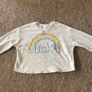 Junior’s White Long Sleeve with Rainbow and 'Lucky' Print